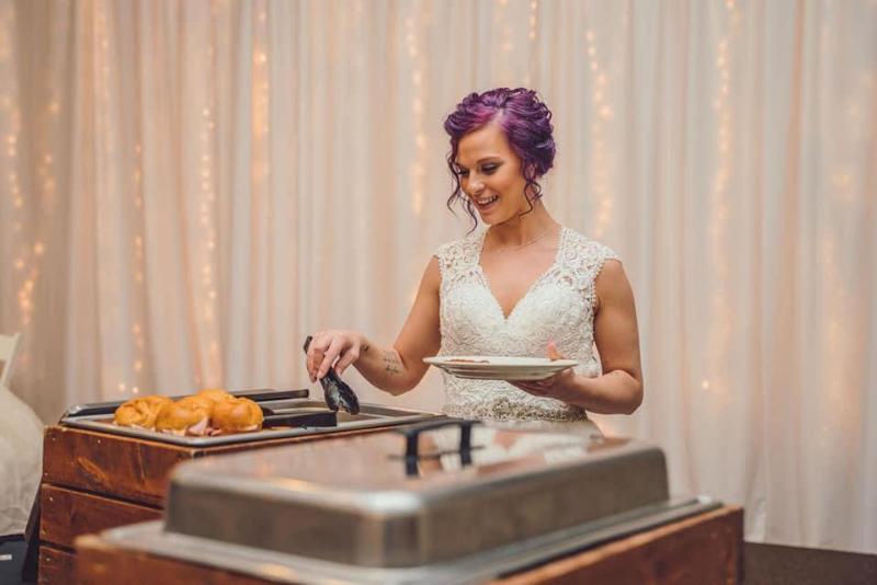 Bride going through catering buffet