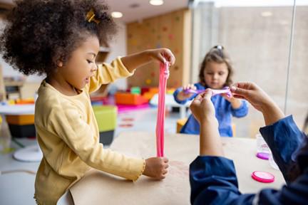 Child Playing During Enrollment Tour