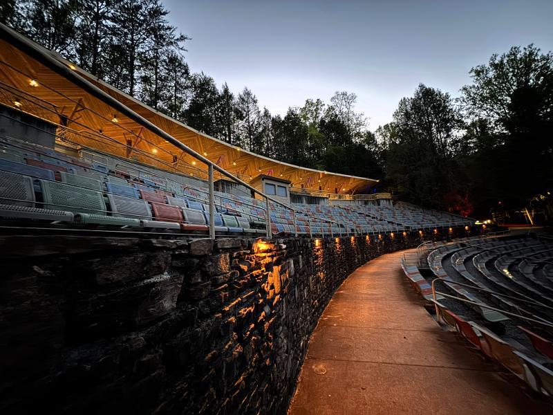 Illuminated amphitheater seating at dusk