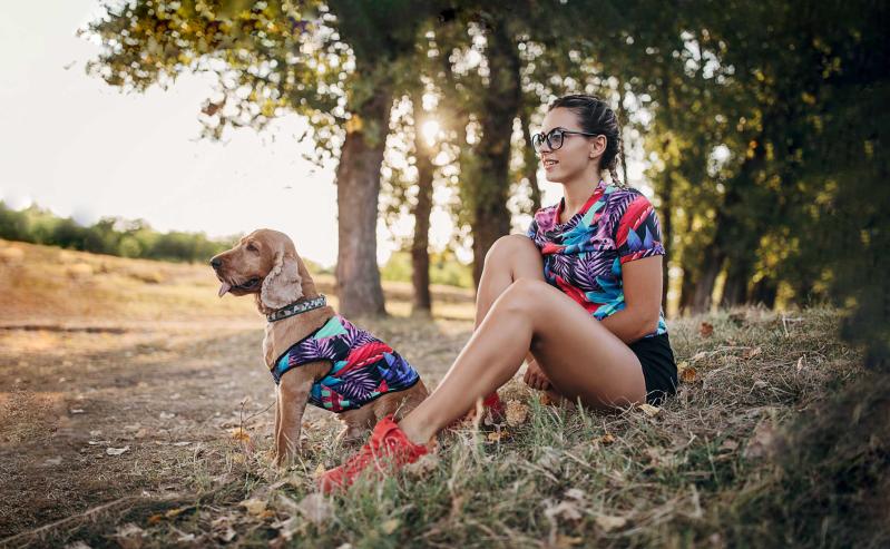 Woman and dog with matching outfits